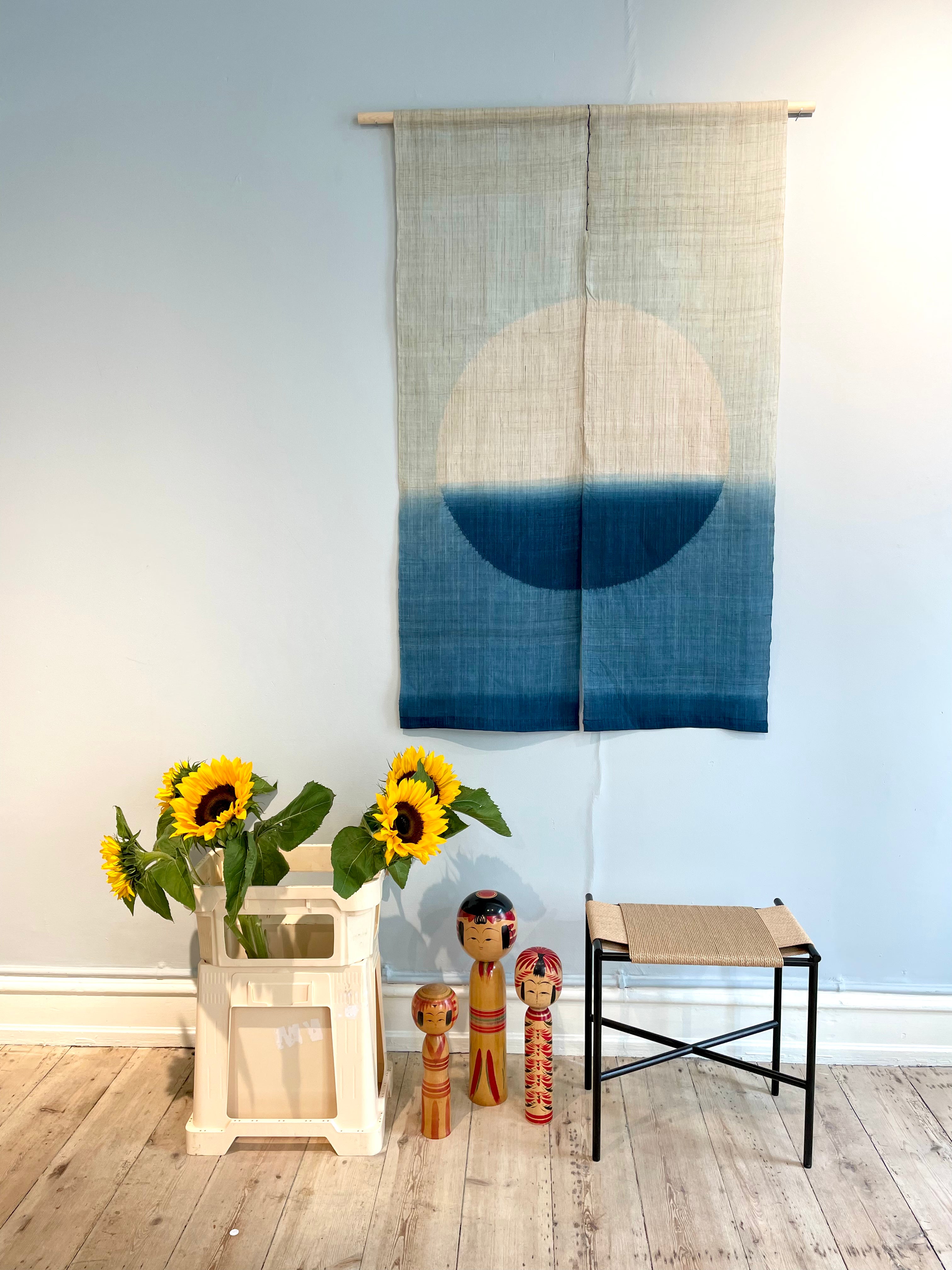 Handmade tapestry in blue with white circle