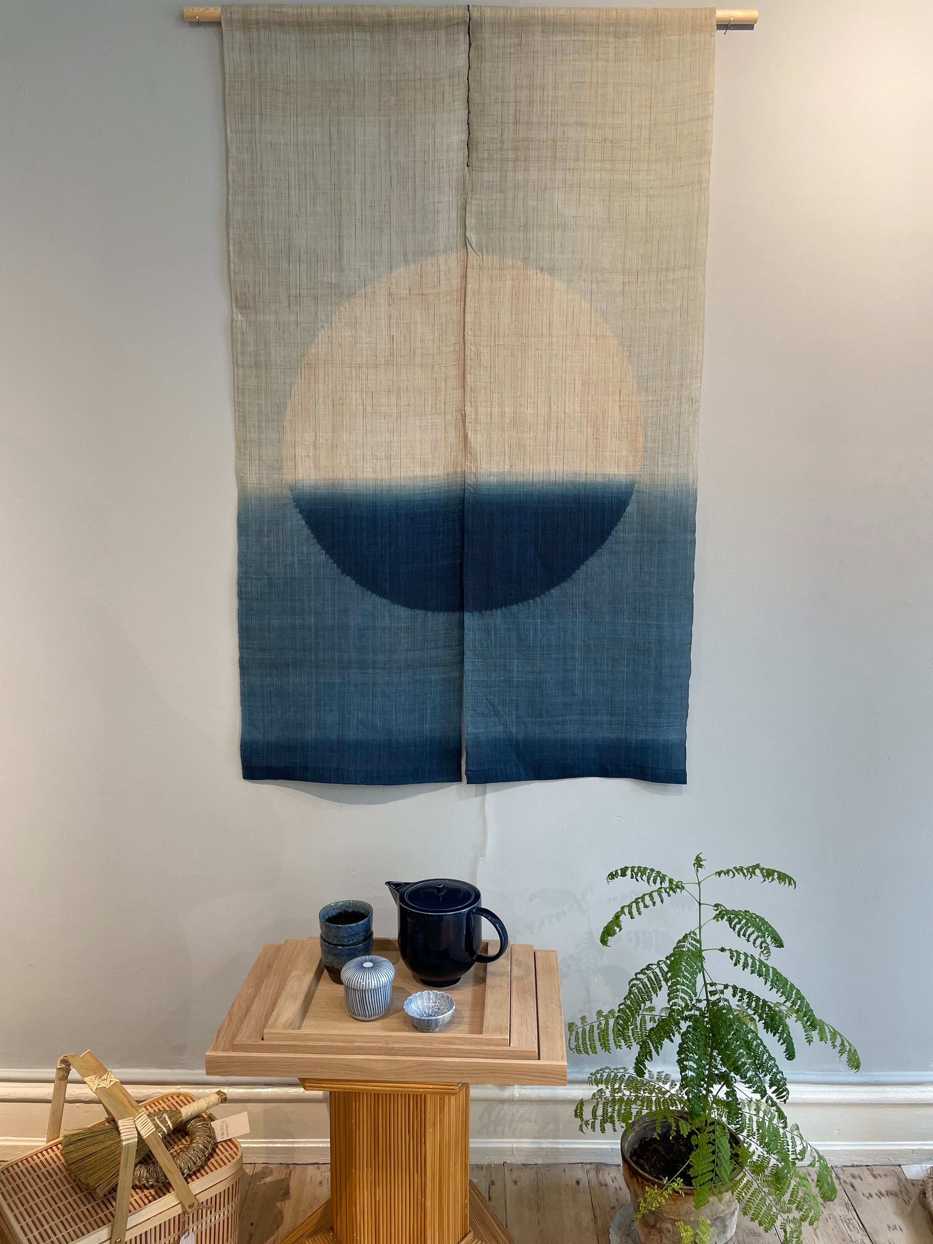 Handmade tapestry in blue with white circle