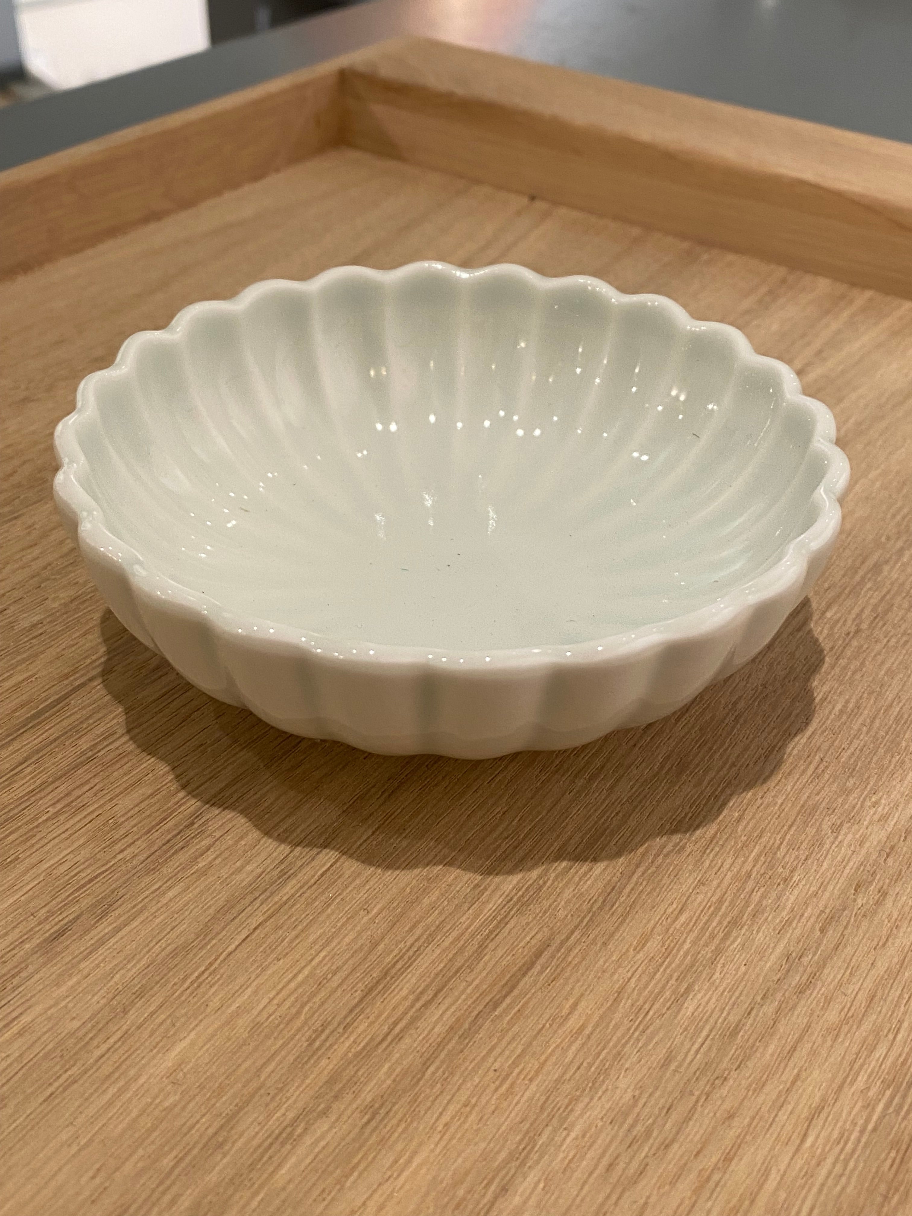 Flower bowl with glaze in pale mint green