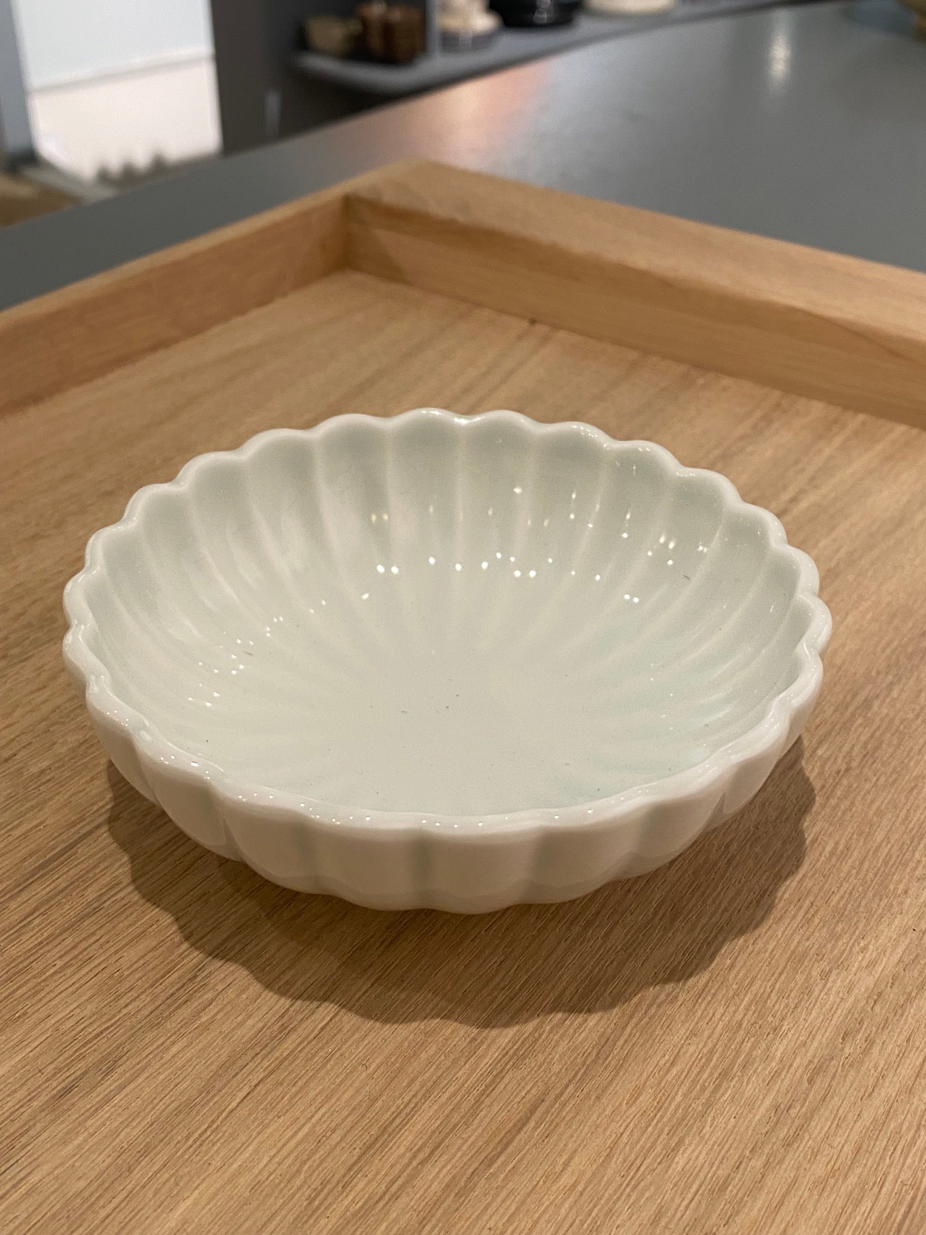 Flower bowl with glaze in pale mint green