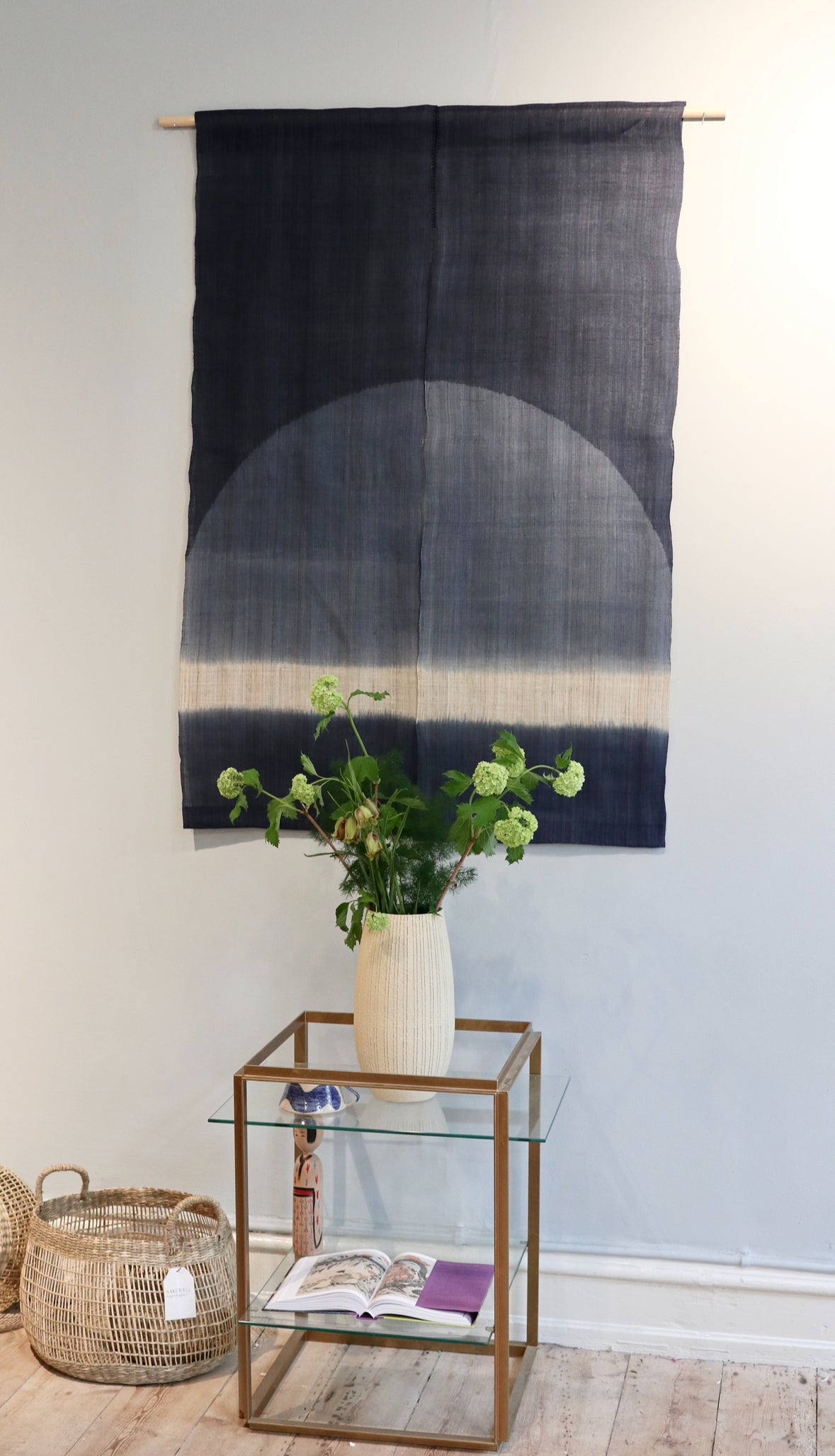 Tapestry with blue shades and half circle