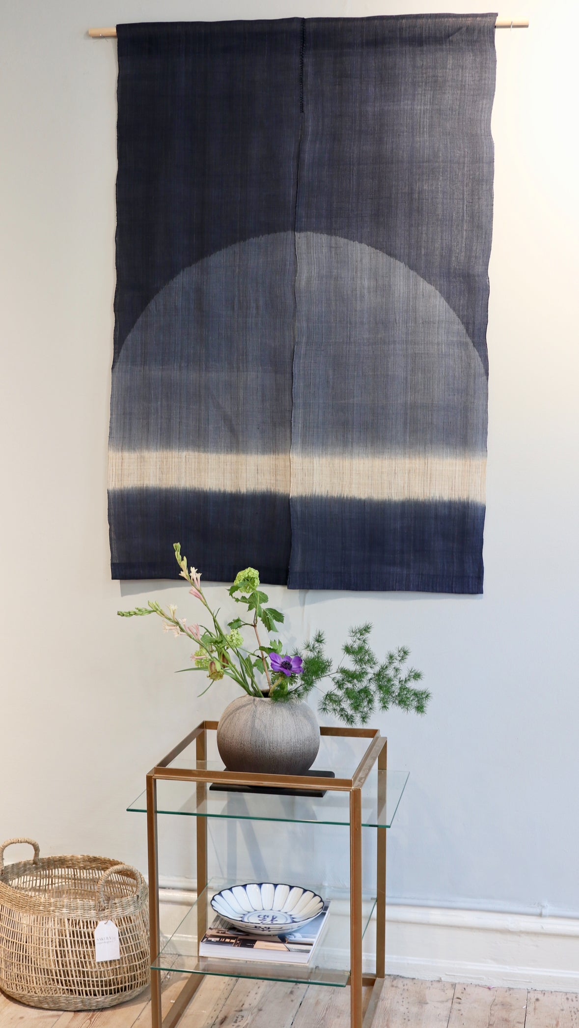 Tapestry with blue shades and half circle