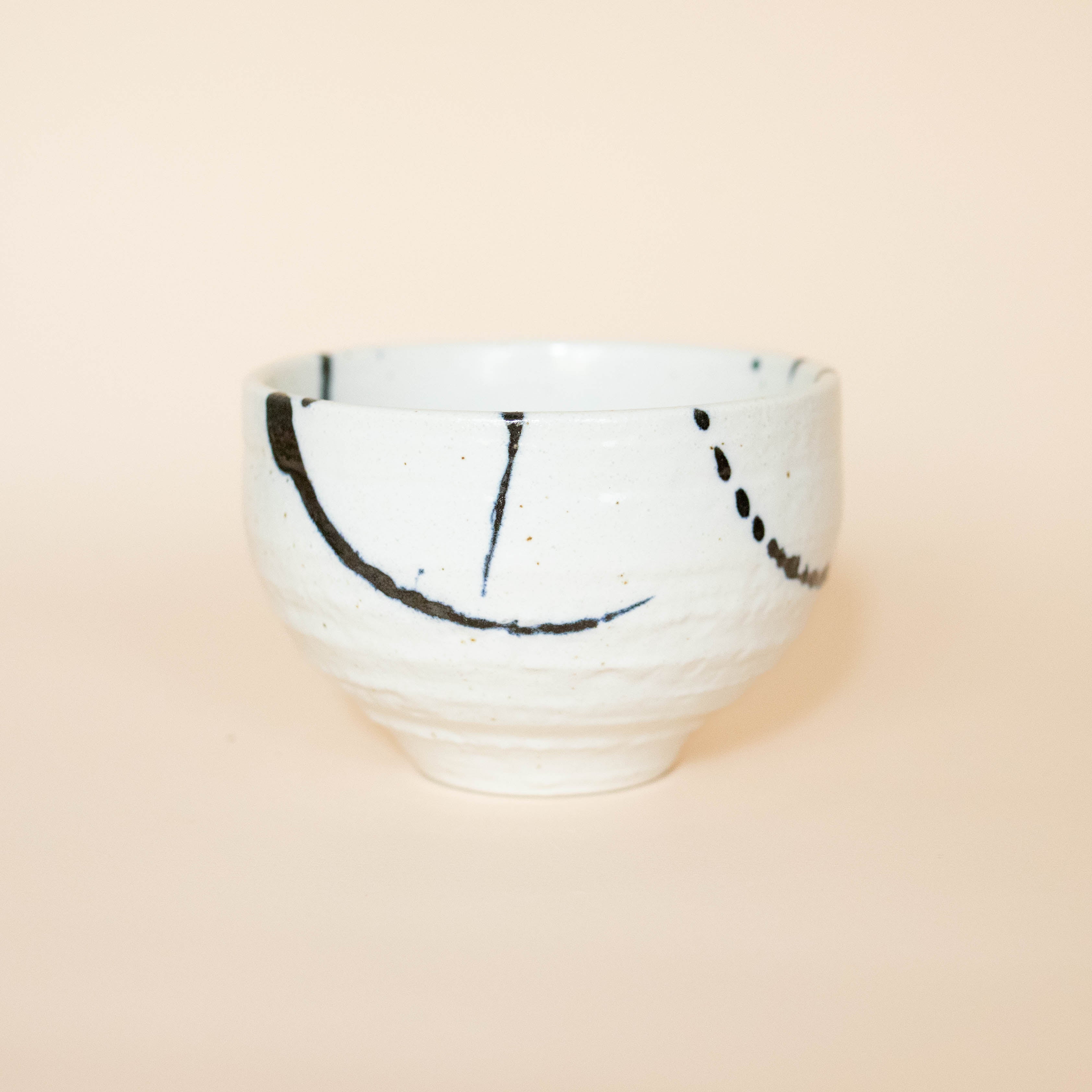 Japanese cup with blue splash pattern