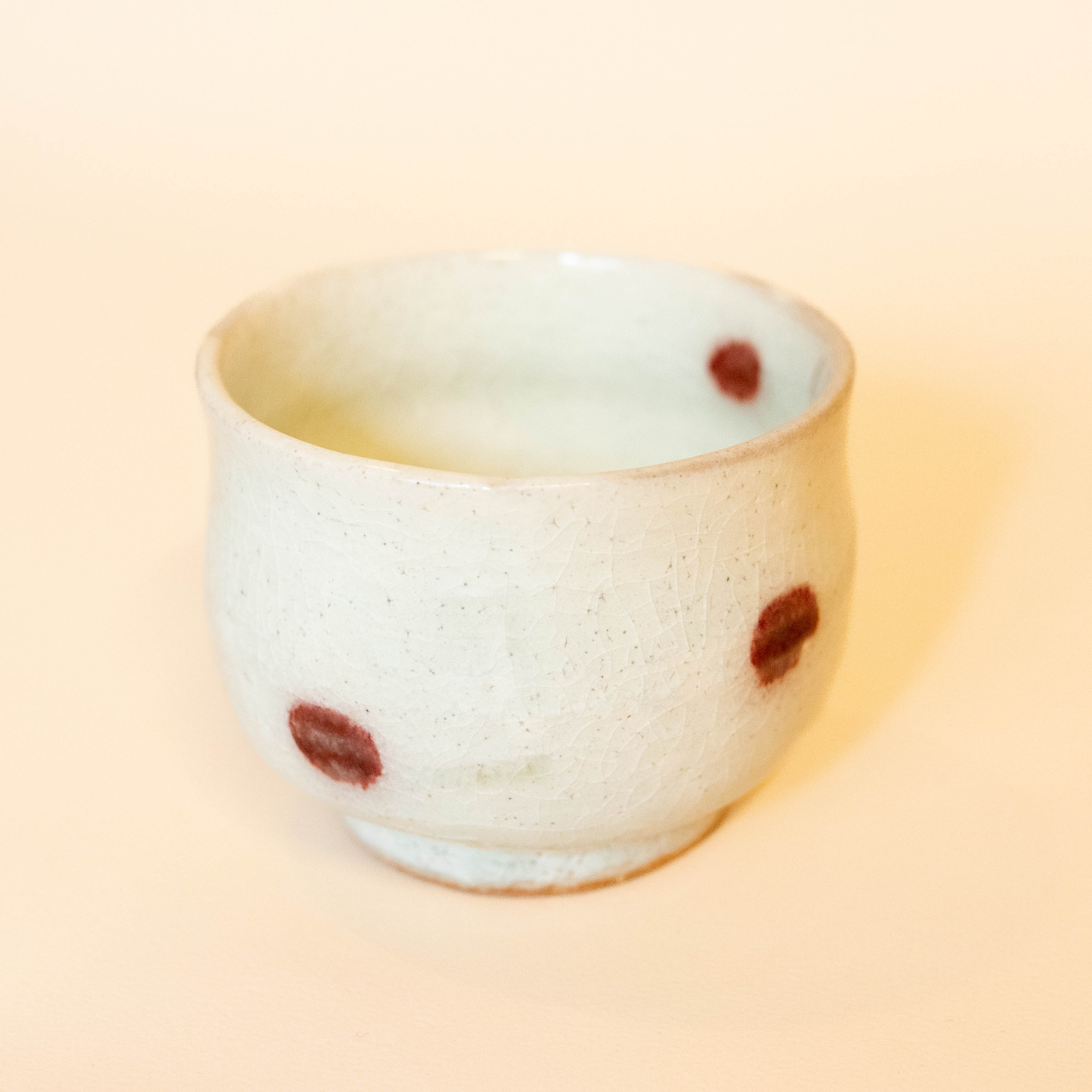 Japanese cup with cherry