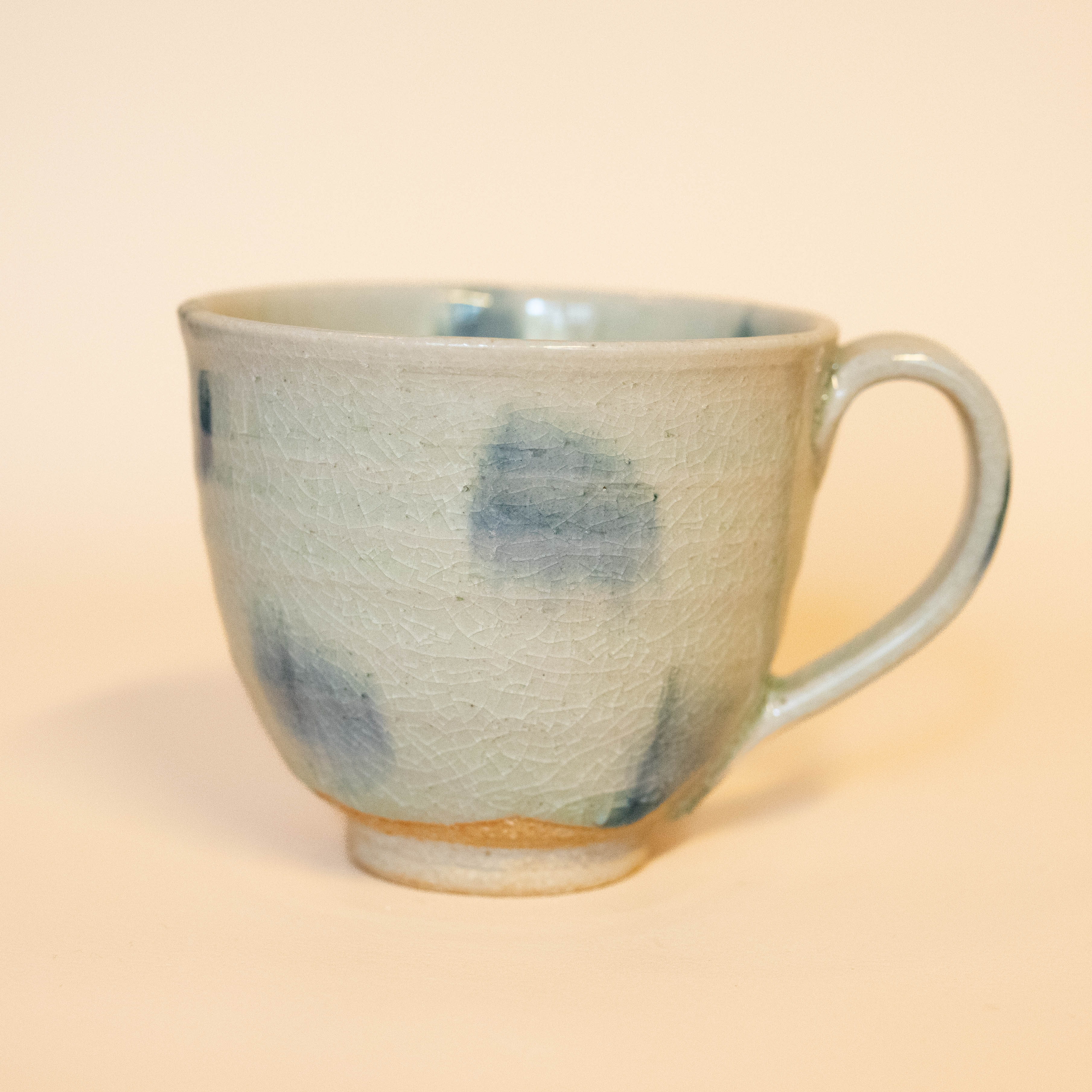 Japanese cup with blue spots and handle