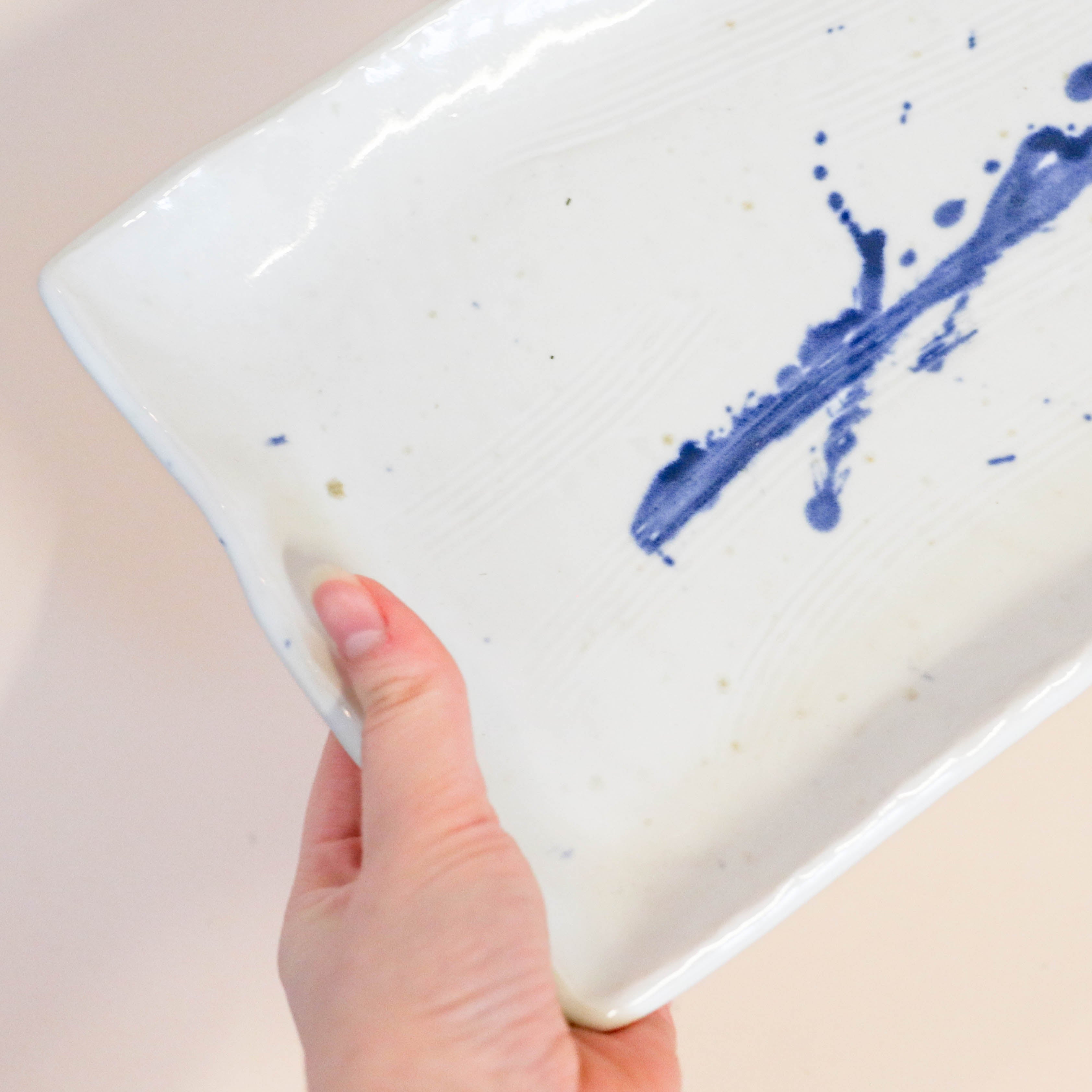 Elongated square dish with blue splash