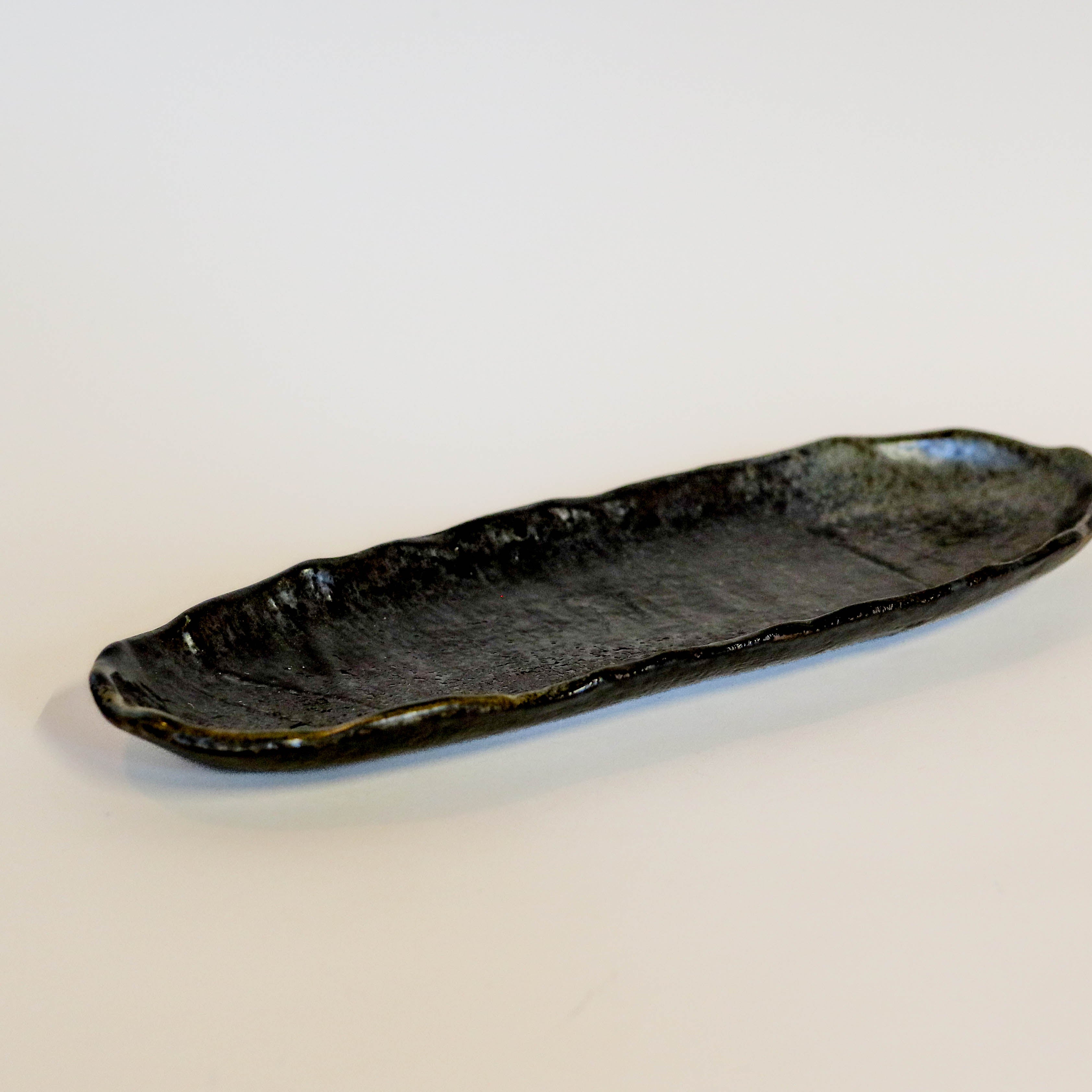 Oblong dish with rustic brown glaze