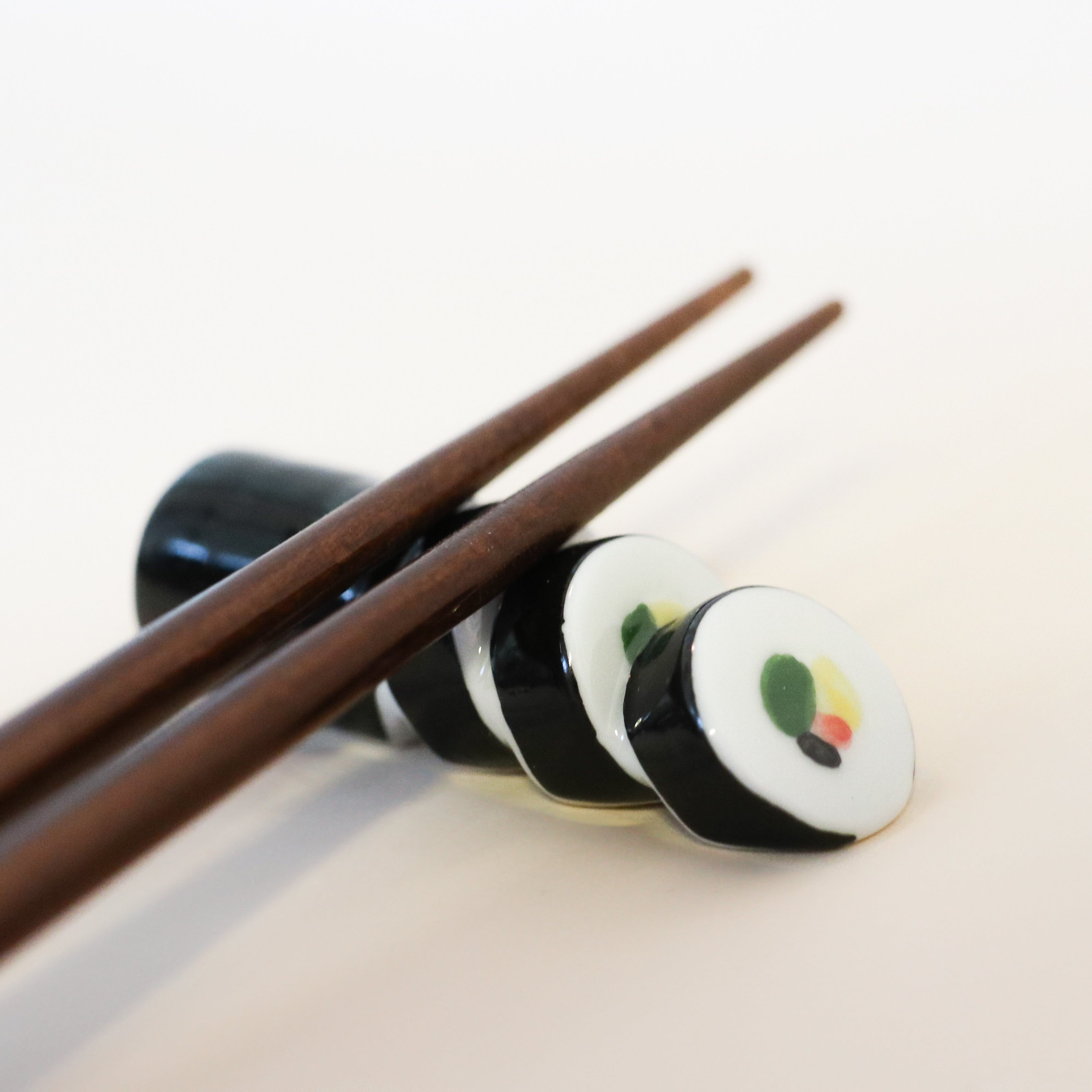 Spisepindeholder - Sushi rulle