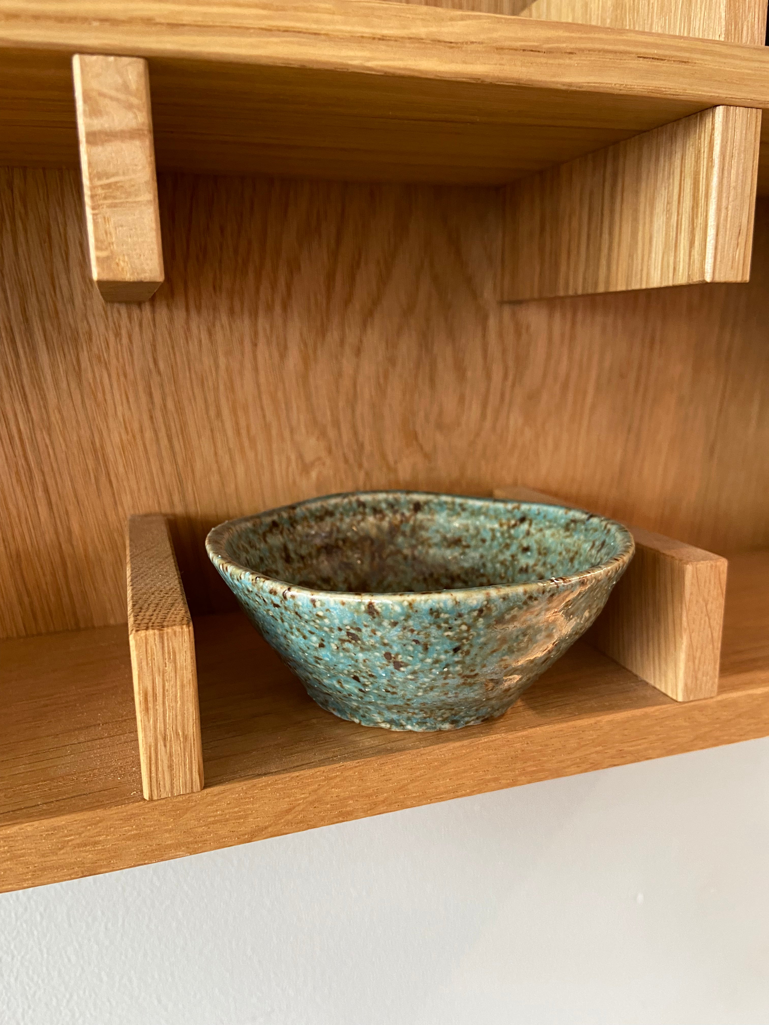 Small bowl with green and brown glaze