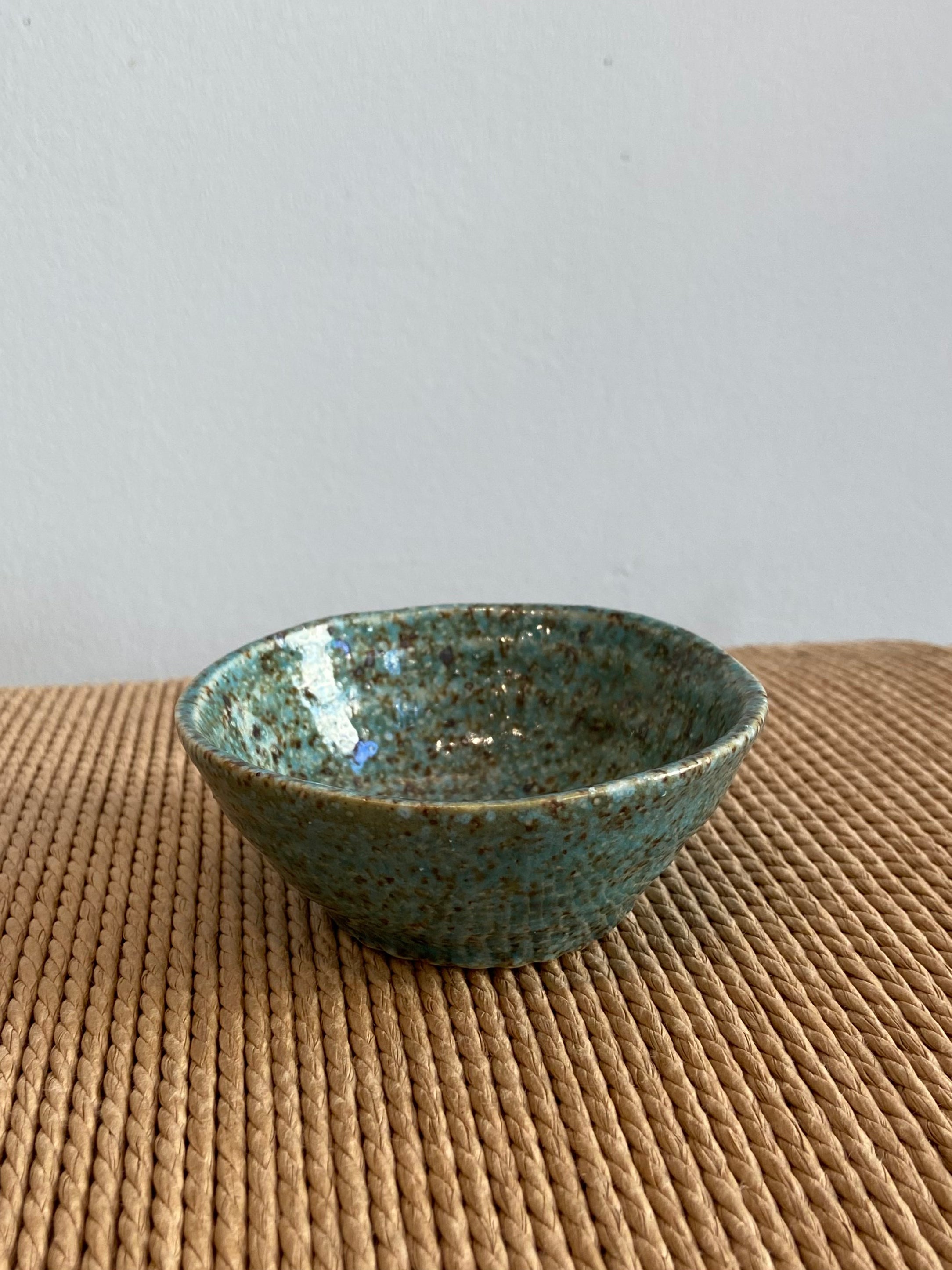 Small bowl with green and brown glaze